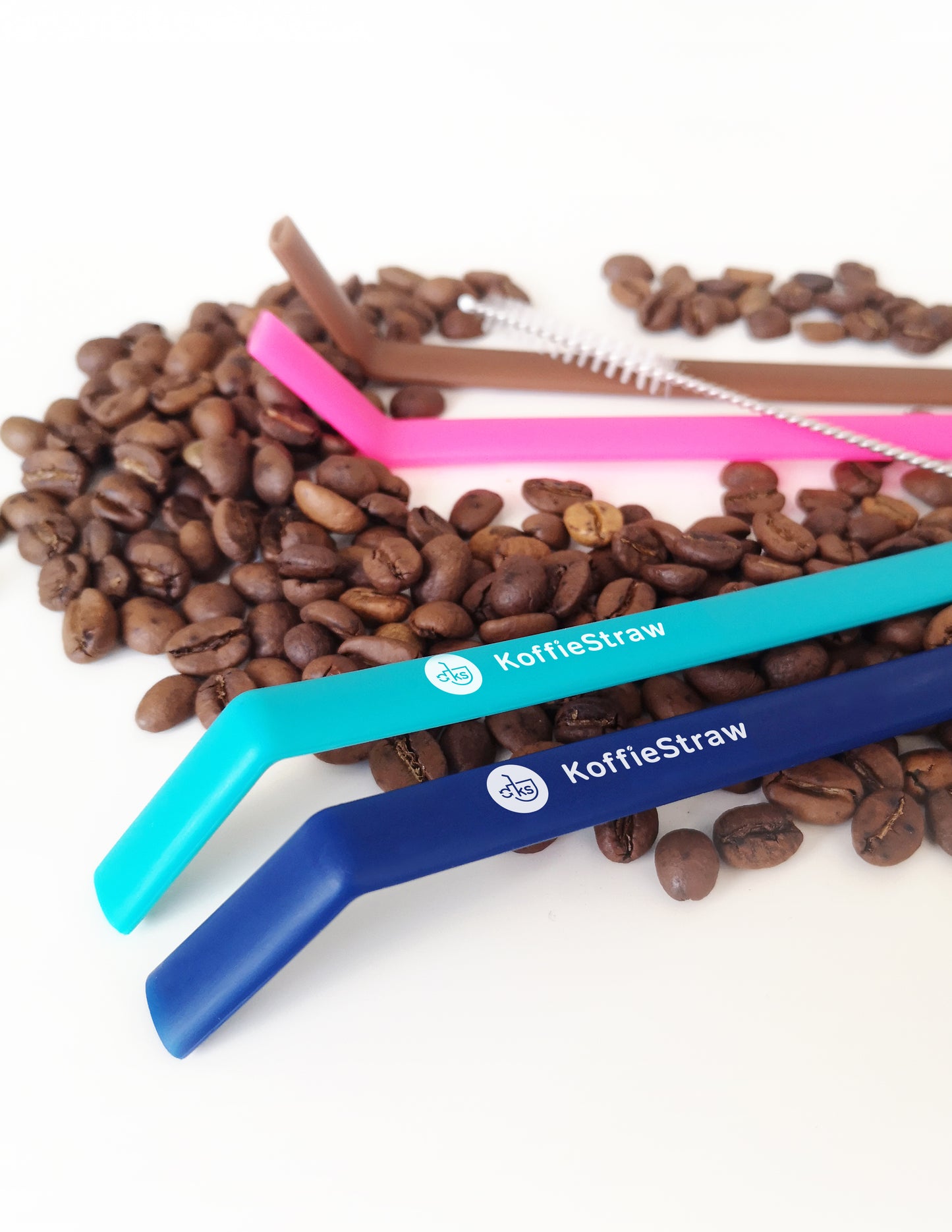 4-Pack of KoffieStraw: Mocha, Navy, Pink, Surf (all 10") with stainless steel cleaning brush in home-compostable packaging