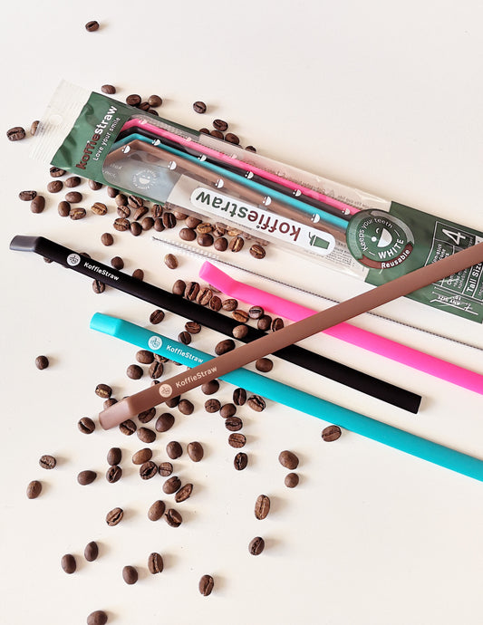 4-Pack of KoffieStraw 10": Pink, Black, Mocha, Surf with stainless steel cleaning brush in a home compostable packaging